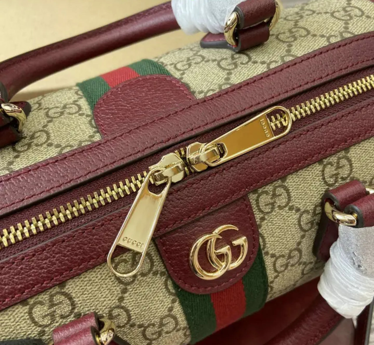Ophidia Top Handle Bag