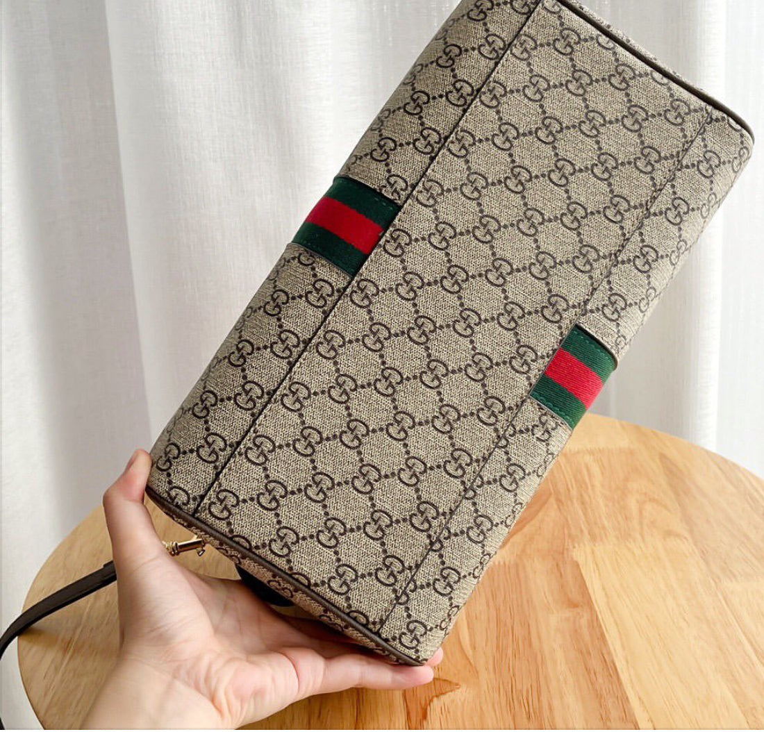 Ophidia Top Handle Bag