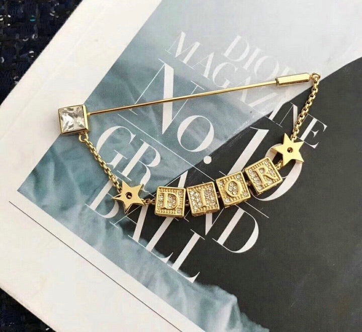 D Brooch