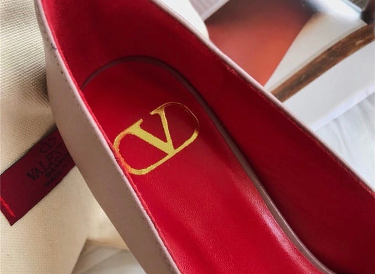 V Logo Pump