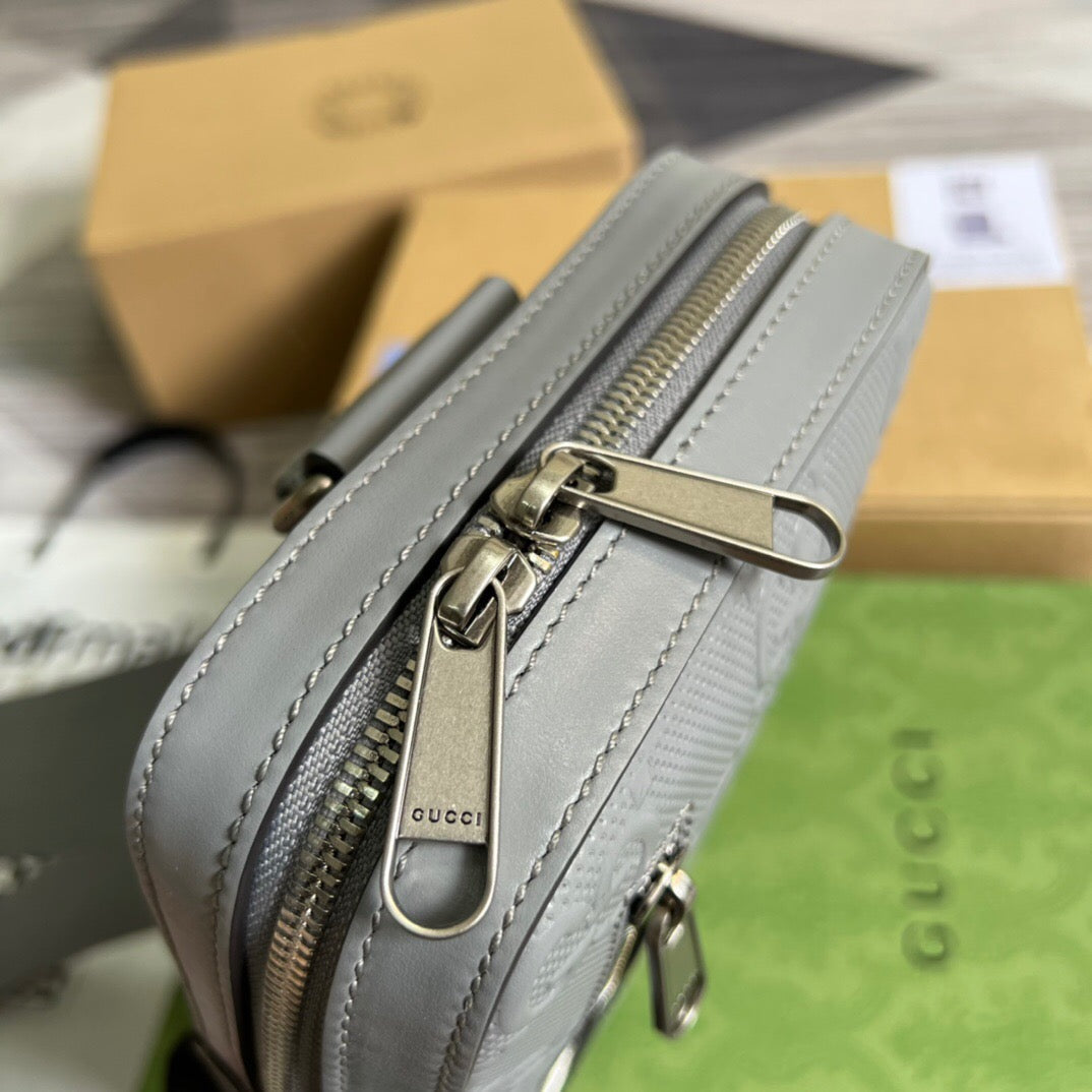 GG Embossed Sling Bag