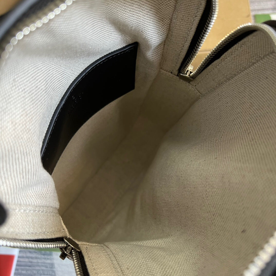 GG Embossed Sling Bag