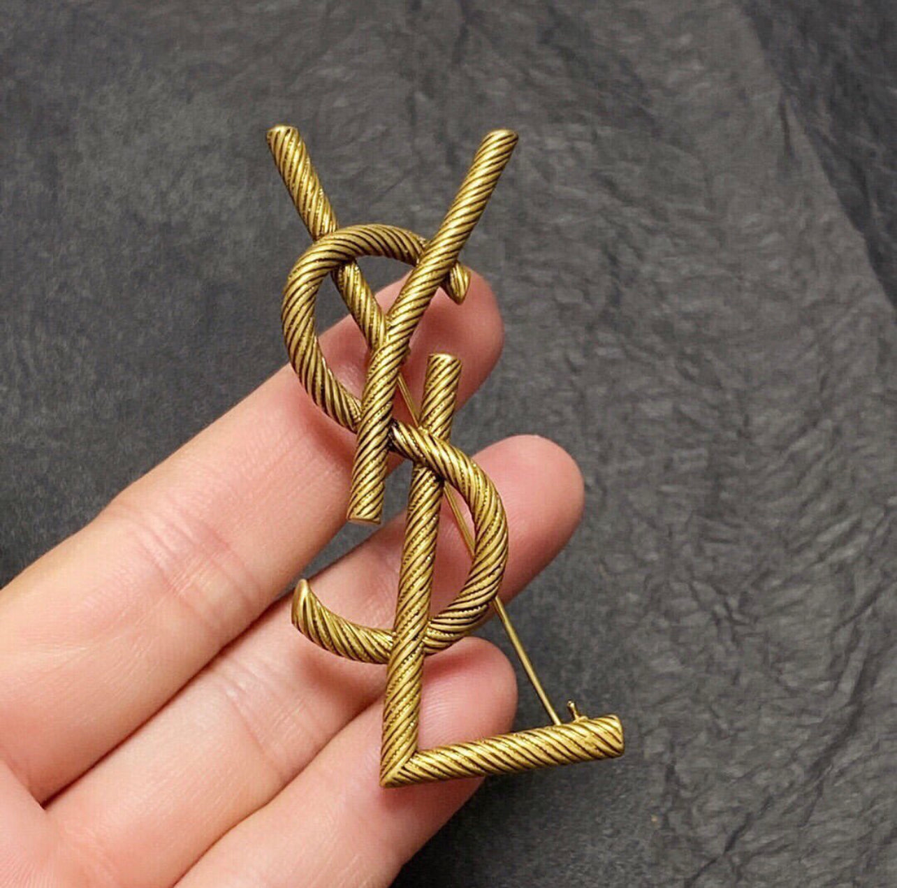 Logo Brooch