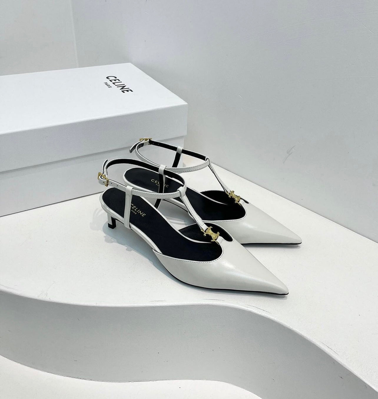 Triomphe Pumps