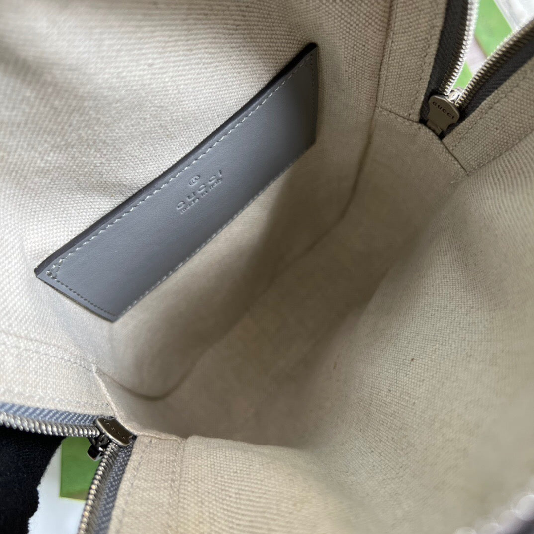 GG Embossed Sling Bag