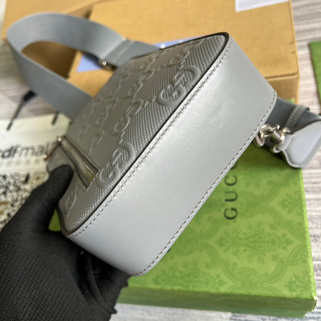 GG Embossed Sling Bag