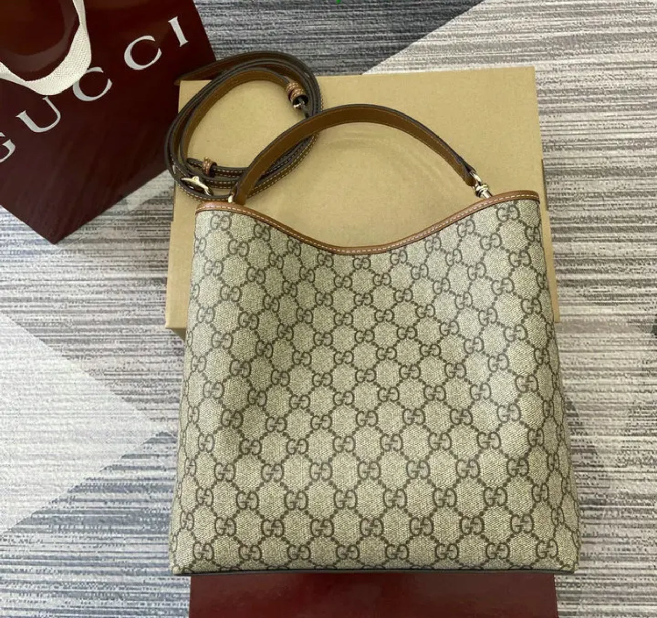 Emblem Bucket Bag