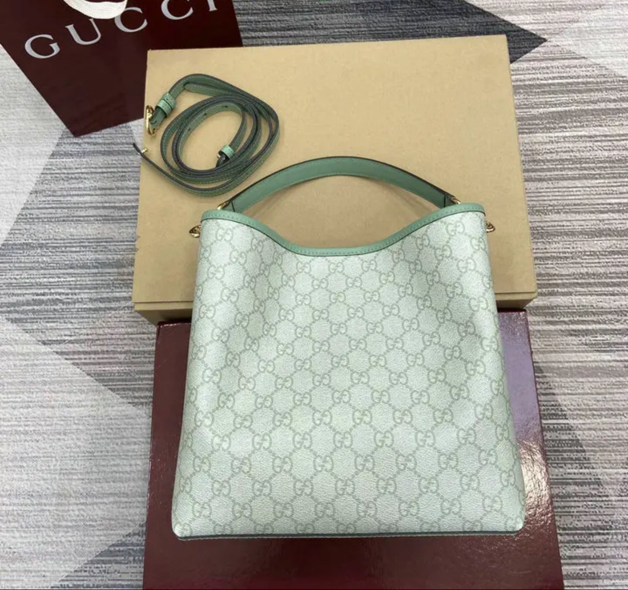 Emblem Bucket Bag
