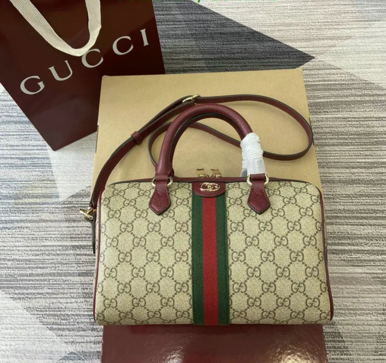 Ophidia Top Handle Bag