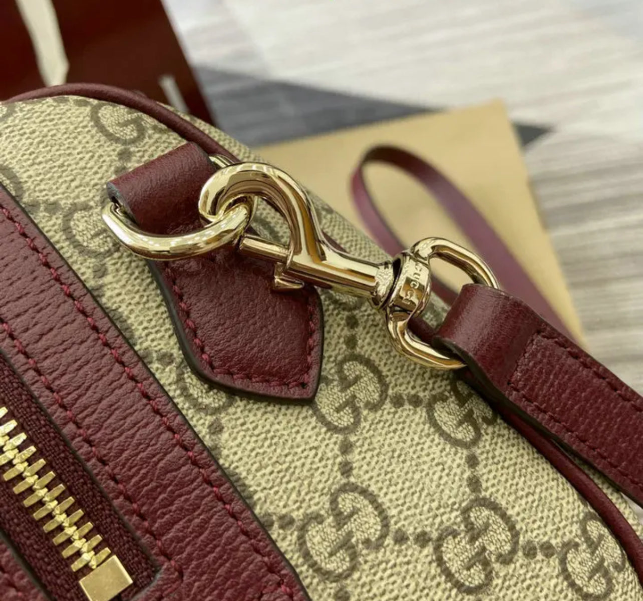 Ophidia Top Handle Bag