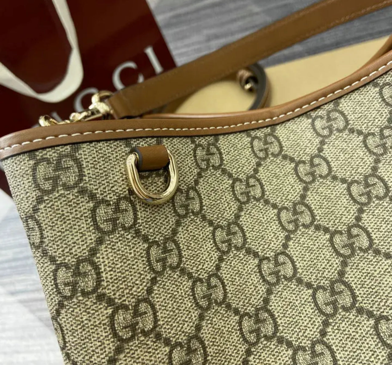 Emblem Bucket Bag