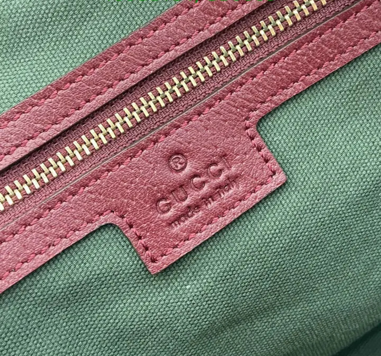 Ophidia Top Handle Bag