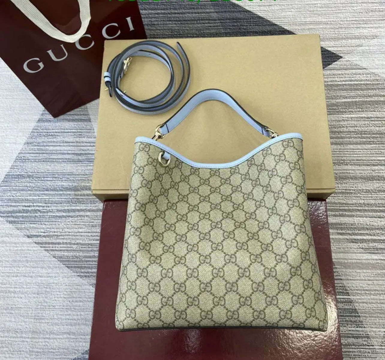 Emblem Bucket Bag