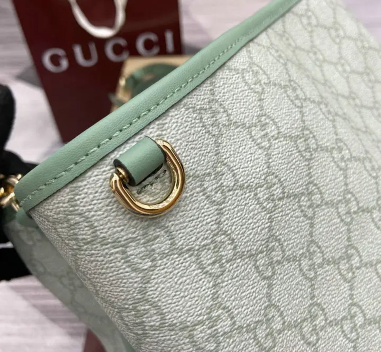 Emblem Bucket Bag