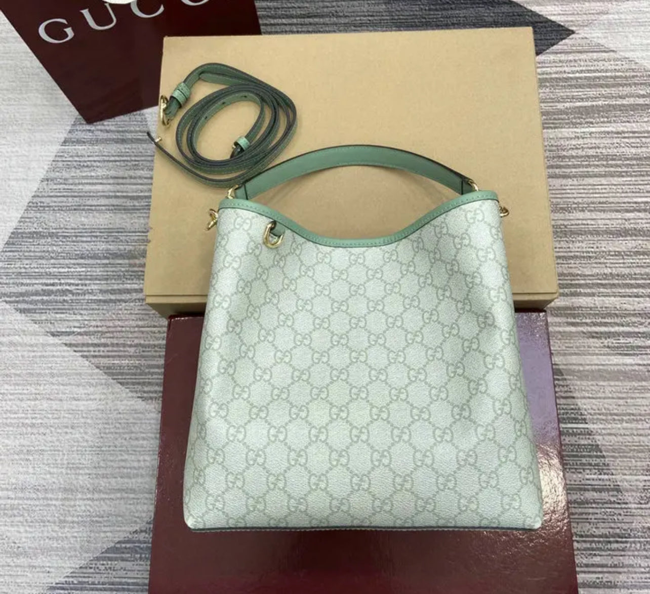 Emblem Bucket Bag