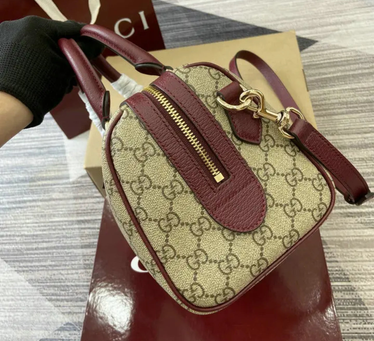 Ophidia Top Handle Bag